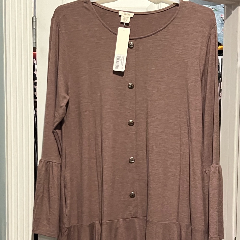 New with tags mocha ruffle dress. Never worn. Bell sleeves